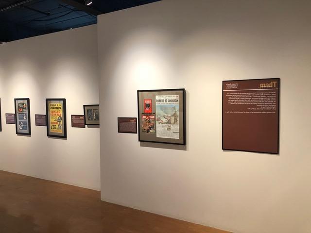 artifacts of racism displayed on gallery wall